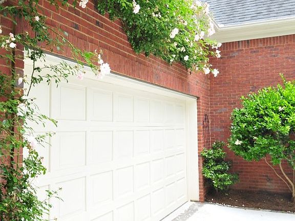 Climbing rose over side entry garage