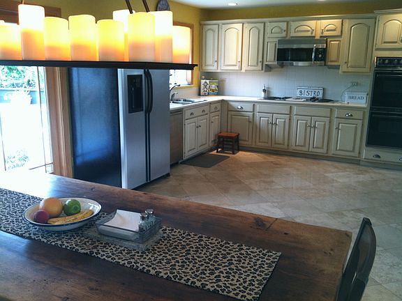 Kitchen has tons of views to back yard