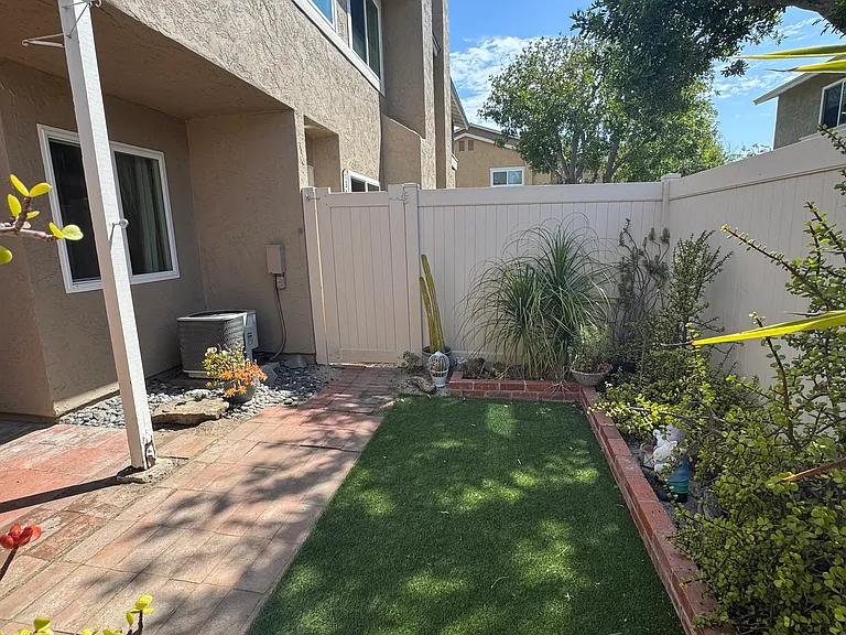 Fully fenced, low-maintenance backyard: your own private oasis!