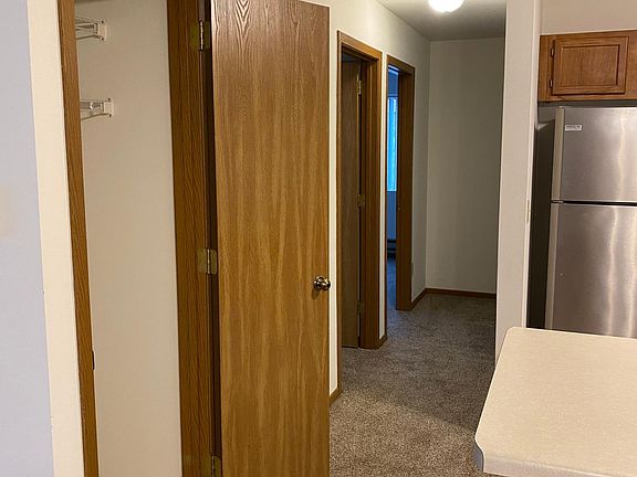 Hallway off of kitchen to bedrooms and bathroom.