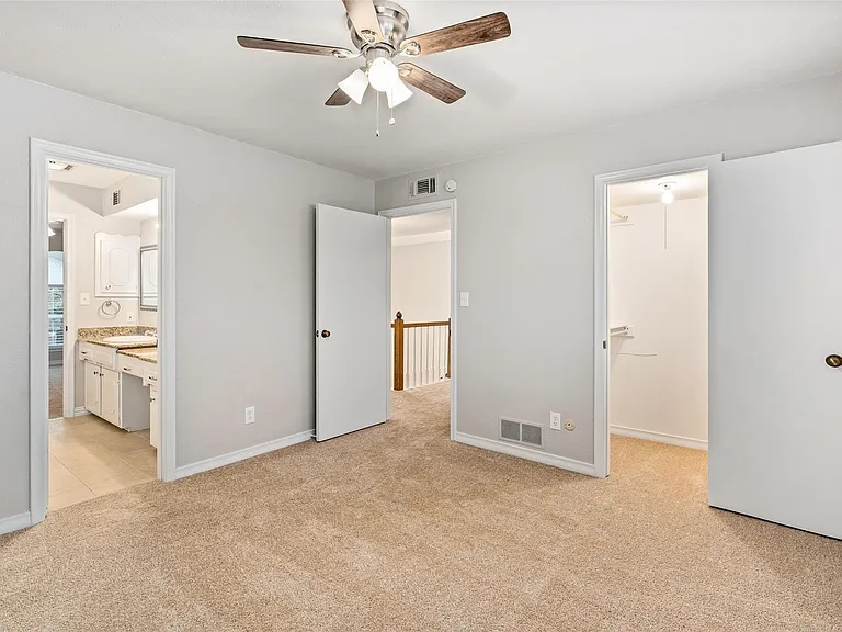 One of the two Guest bedrooms upstairs with Jack and Jill bath between them.