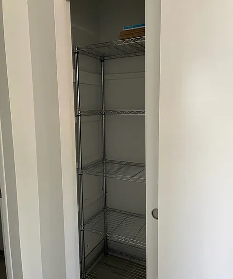 Hall closet 2 with shelving