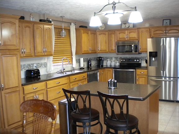 Honey Maple Bertch  Cabinets