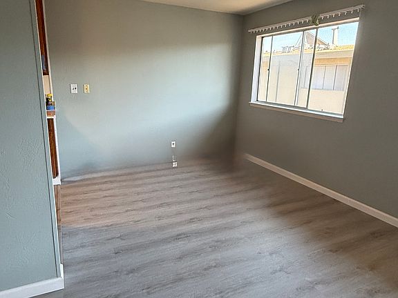 Large Windows. Spacious Dining Room and Kitchen