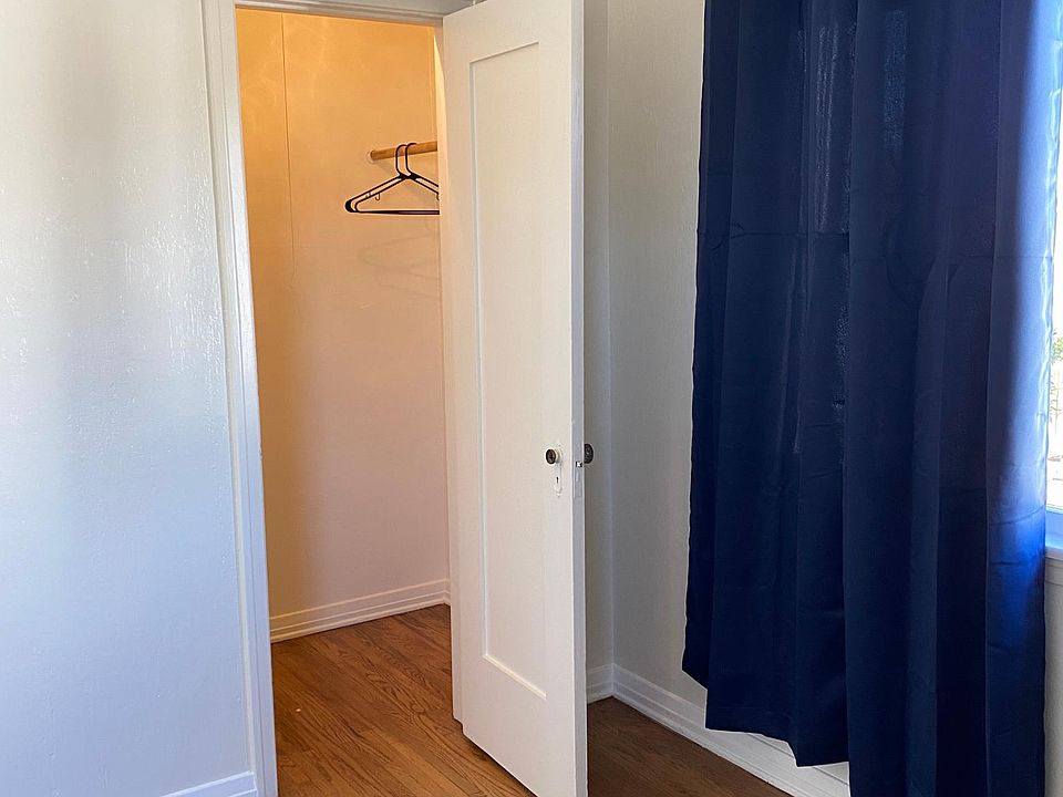 one of two bedroom closets