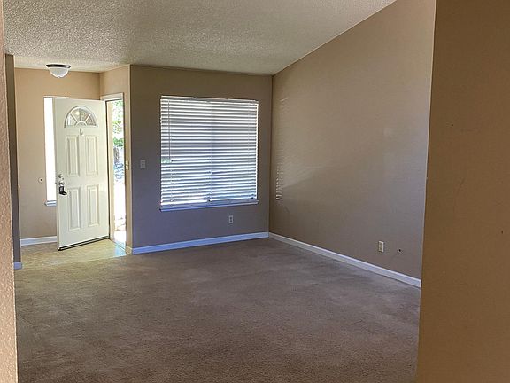 Living room with vaulted ceilings