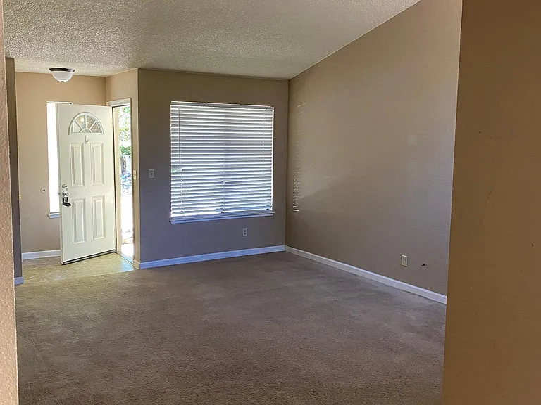 Living room with vaulted ceilings