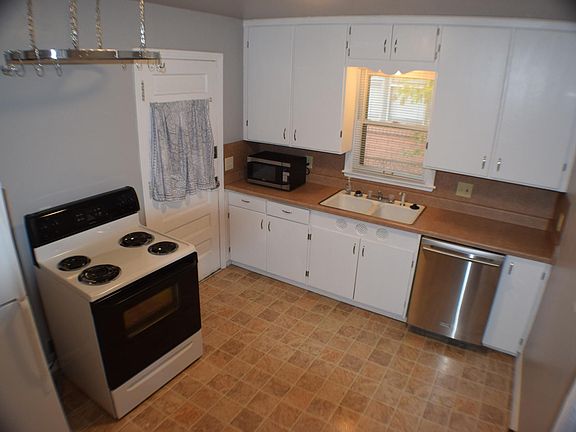 Kitchen with microwave, new dishwasher, new garbage disposal