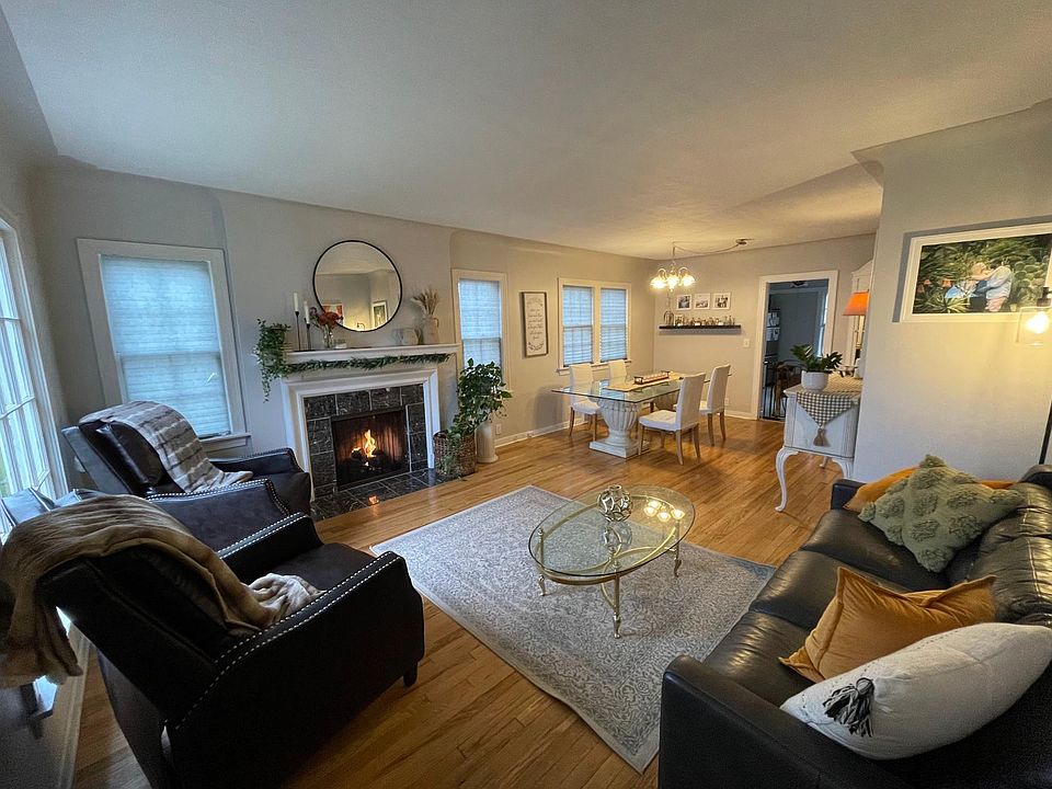 Beautiful living room with original warm oak hardwood flooring, perfect for entertaining guests