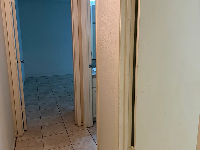 Hallway to bedrooms and bathroom