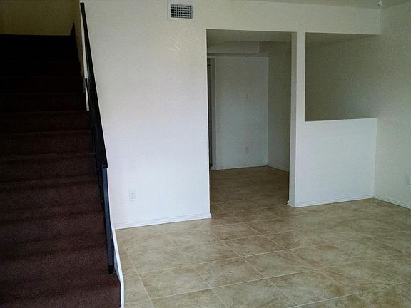 Living Room with NEW TILE FLOORING!