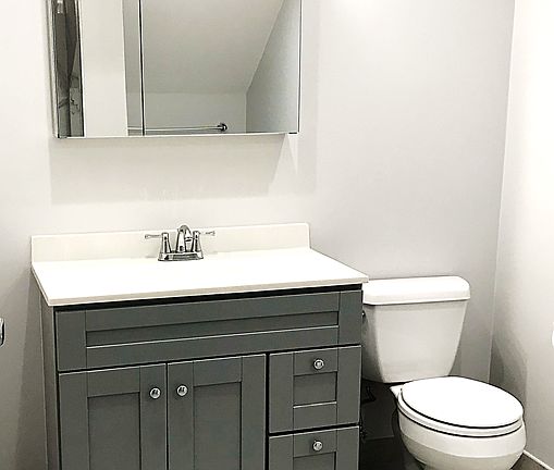 Bathroom: The recently remodeled bathroom also has new cabinets and flooring.