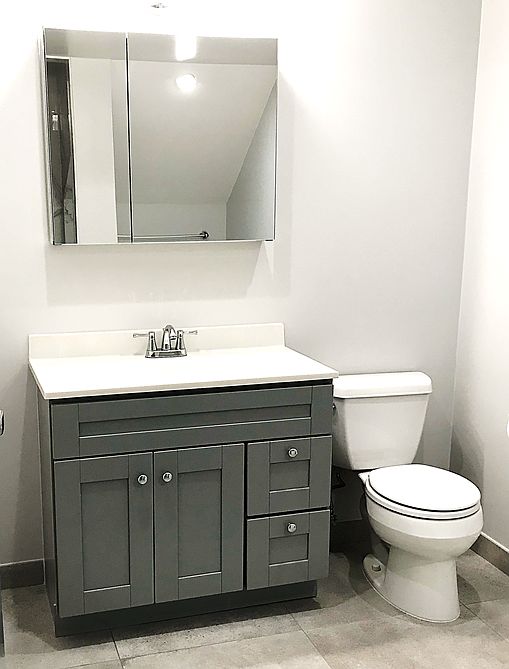 Bathroom: The recently remodeled bathroom also has new cabinets and flooring.