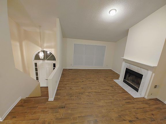 Great Family Room with Vaulted ceilings and wood-burning fireplace