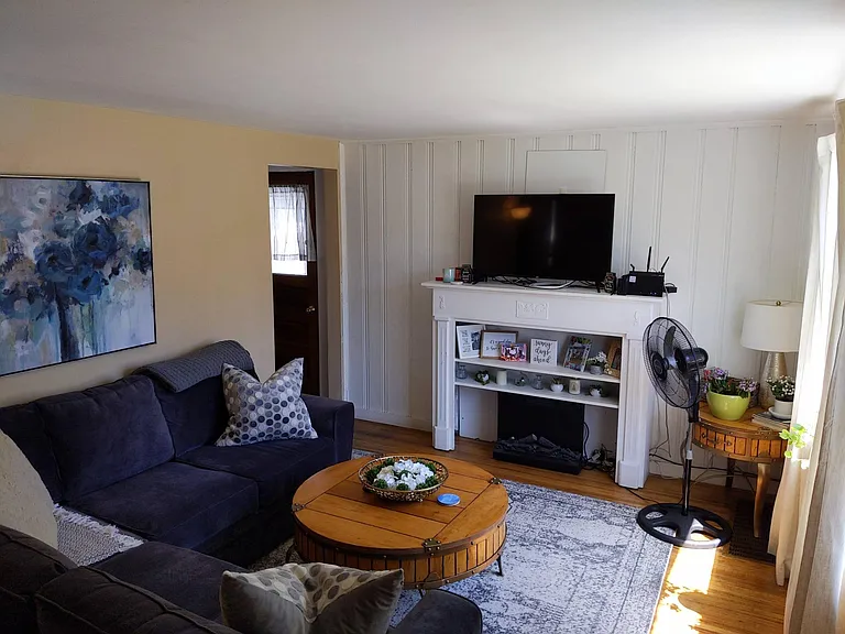 Comfortable living, neutral colored paint, sunny rooms