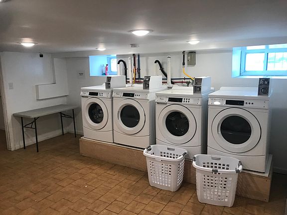 Laundry room with folding table