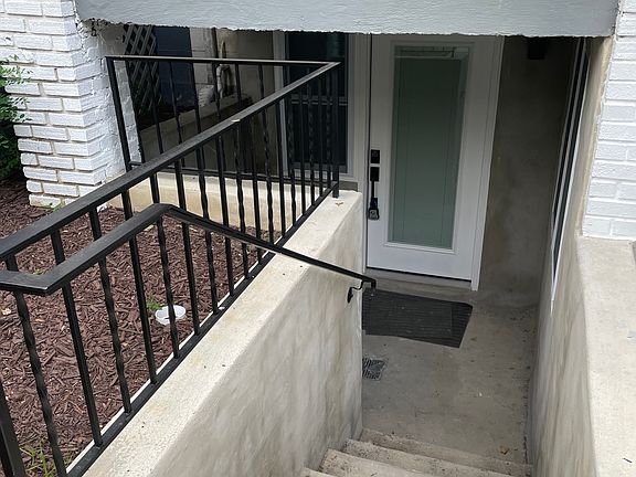 Entrance stairs and patio.