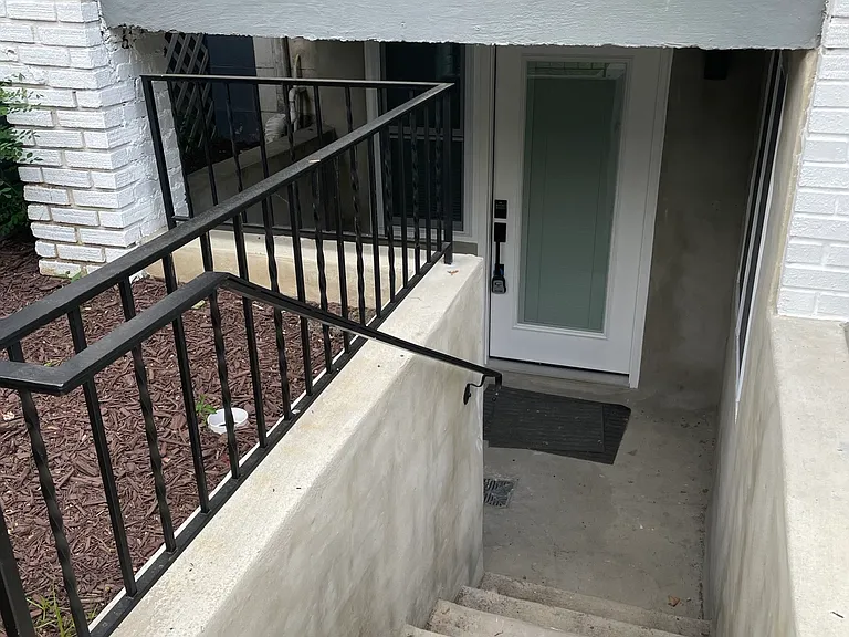 Entrance stairs and patio.