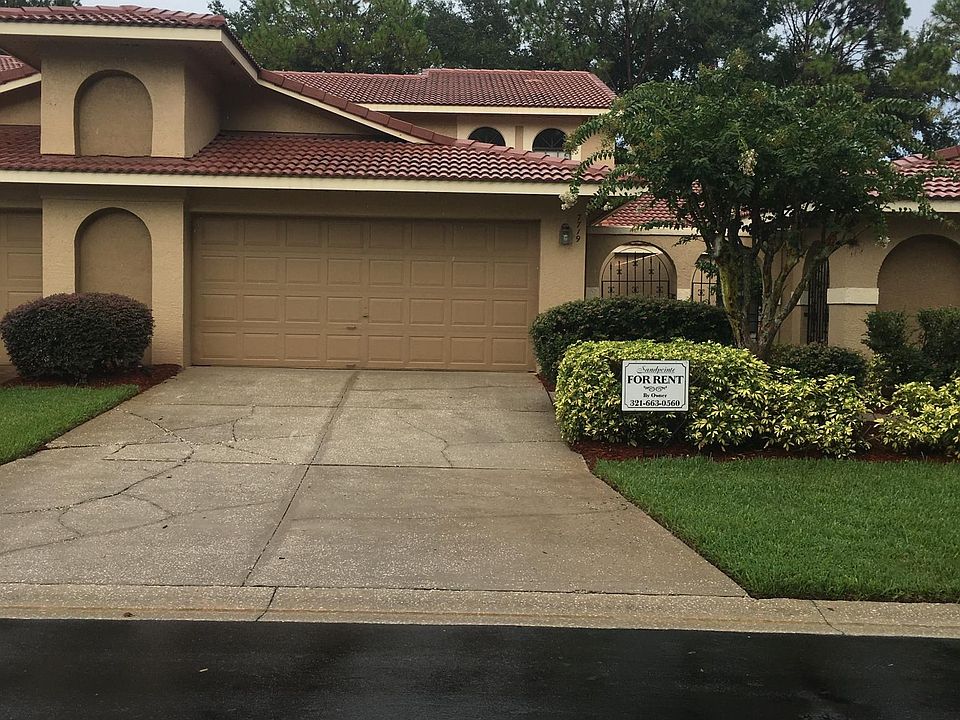 Street view, 2 story townhouse with private attached 2 car garage, courtyard and back porch