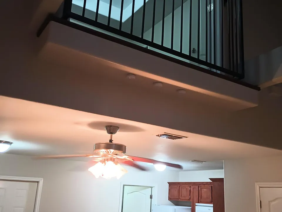 French Quarter style doors open to main living area below