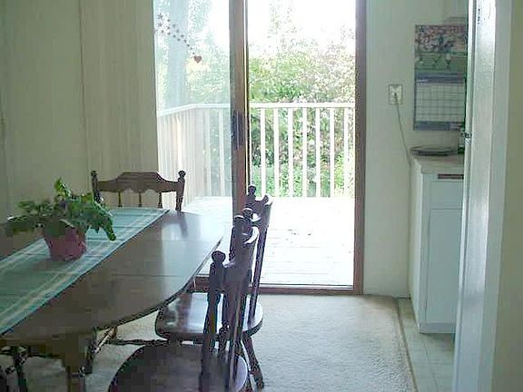Eating space in kitchen w/access to outside deck.