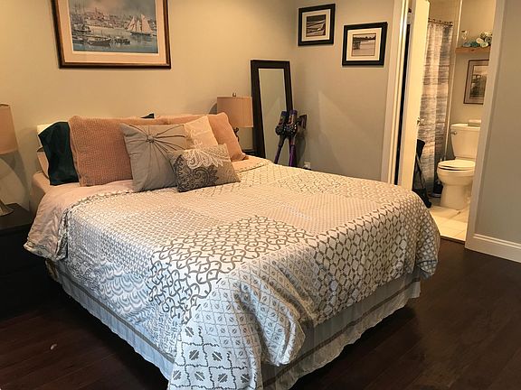 Bedroom. In this photo the door is open to the bathroom