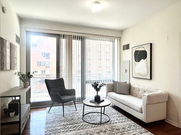 5th image of 1 E 8th St #307