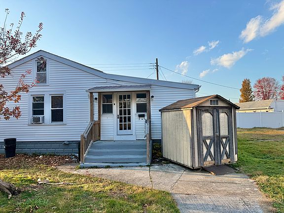 Door to unit B. Storage shed included also!