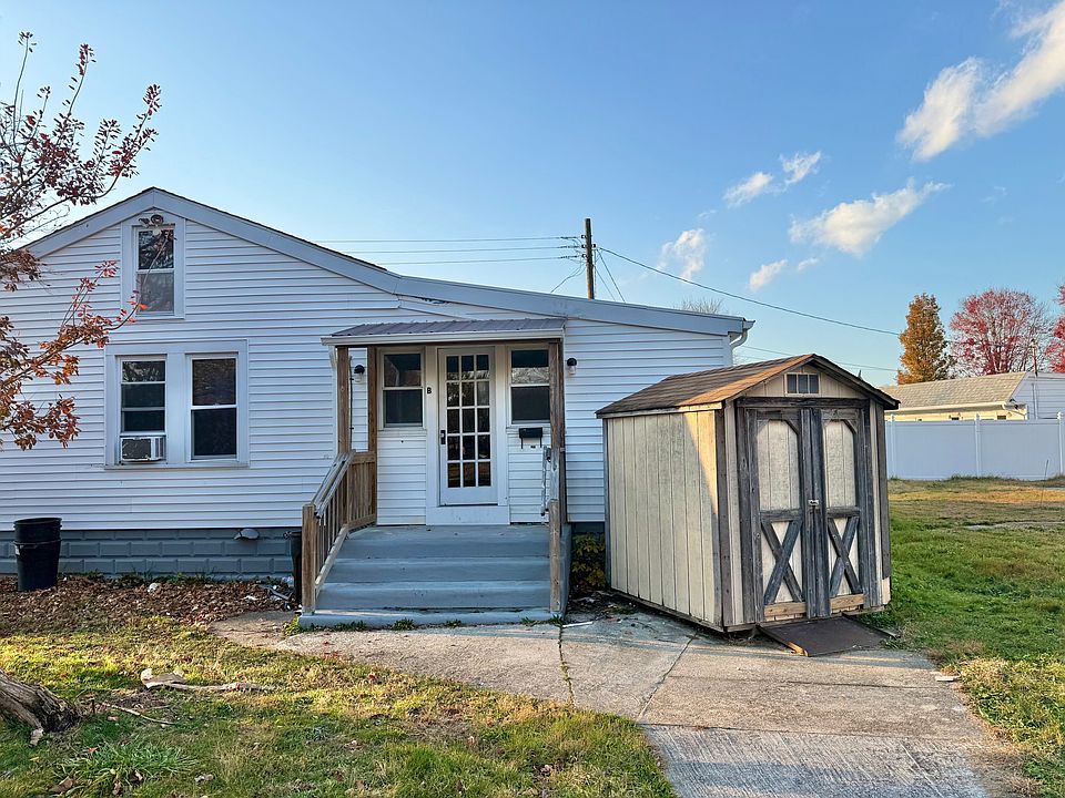 Door to unit B. Storage shed included also!