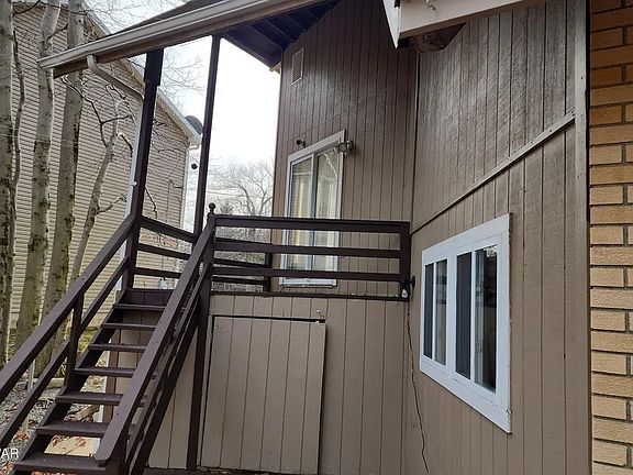 The stairs that lead to the kitchen.