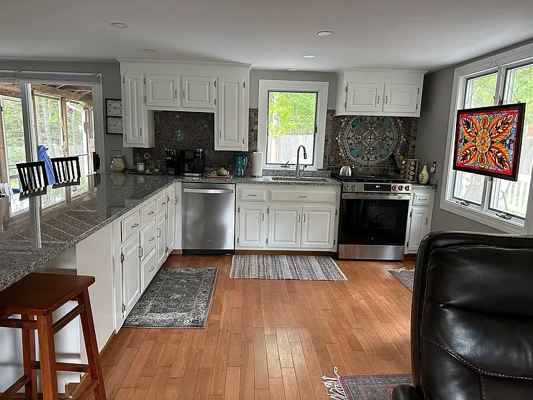 newly renovated kitchen with gas stove