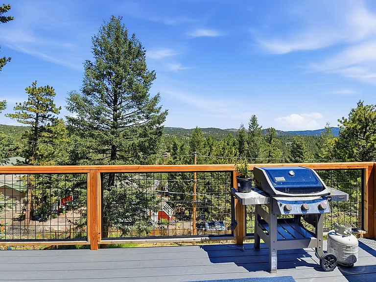 Lower Covered Deck
Rain or shine, this massive covered deck extends your living space outdoors and creates the perfect setting for dining, relaxing, or entertaining year-round.