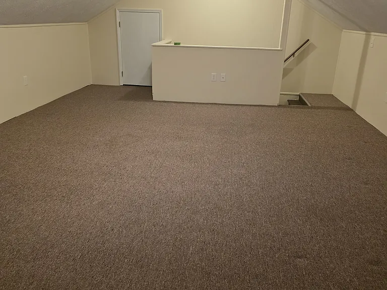 Door to attic for more storage