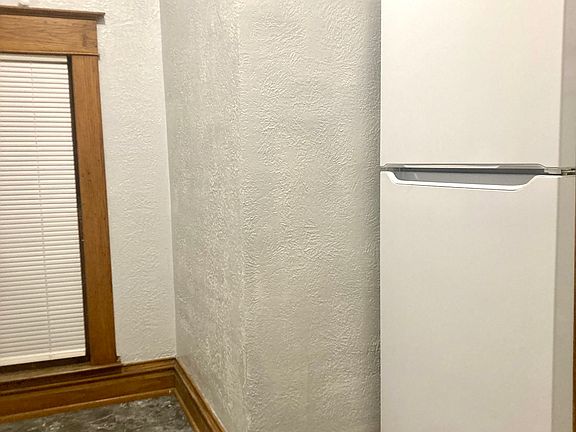 Full size Fridge in kitchen