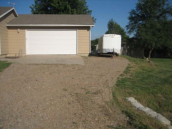 2 car garage with additional side parking