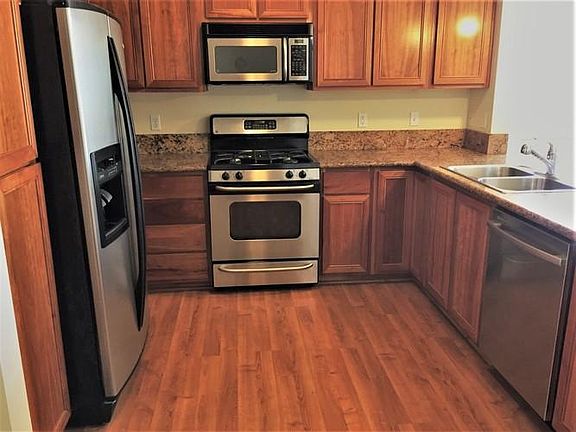 Kitchen with stainless steal appliances and granite countertops