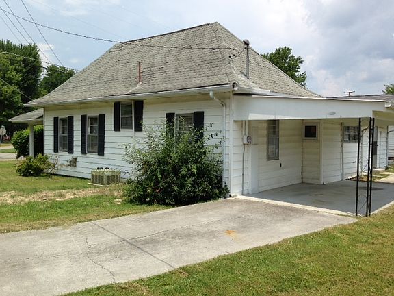 Attached covered carport