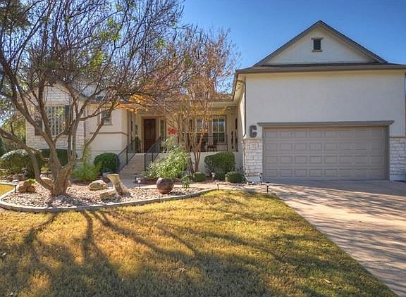 A raised Front Sitting Porch is a perfect place to view the streetscape.