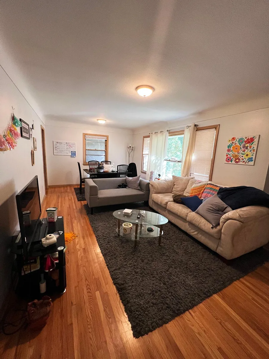 Large living room on the main floor. - 1911 Talmage Ave SE