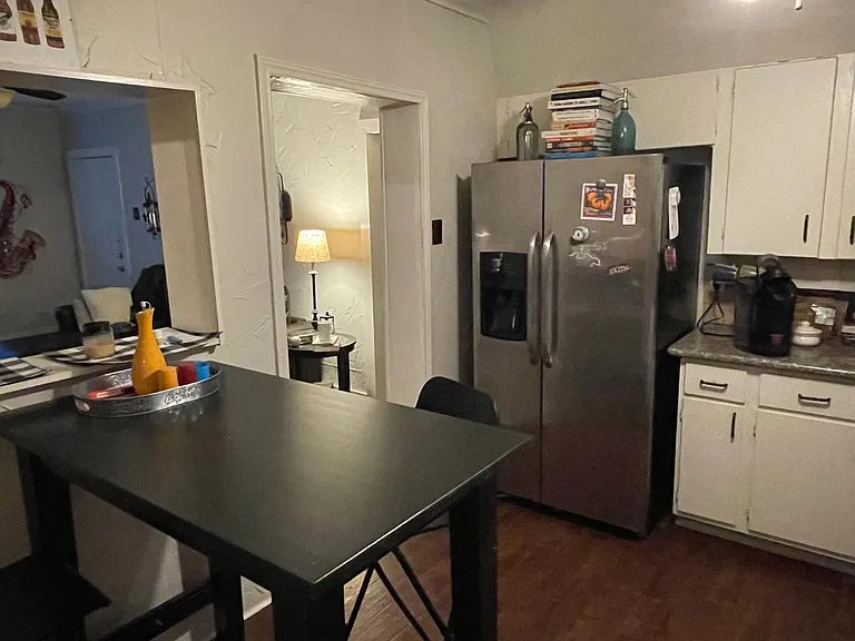 Pass through-bar, stainless appliances and granite counters.