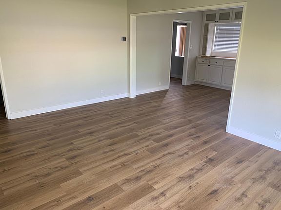 Large Spacious Living Room with Adjoining Dining Area