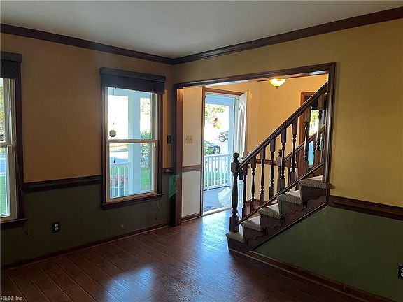 Formal living off of entry foyer.