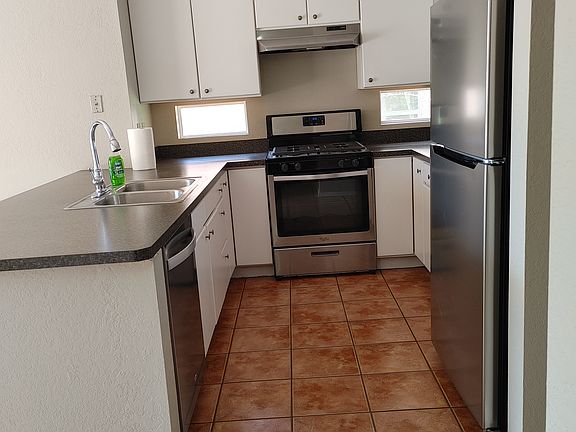 Kitchen/ Stainless Steel appliances, 2 Lazy Susan cupboards and pantry