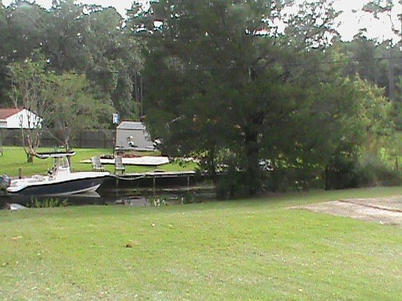 canal behind house & lot