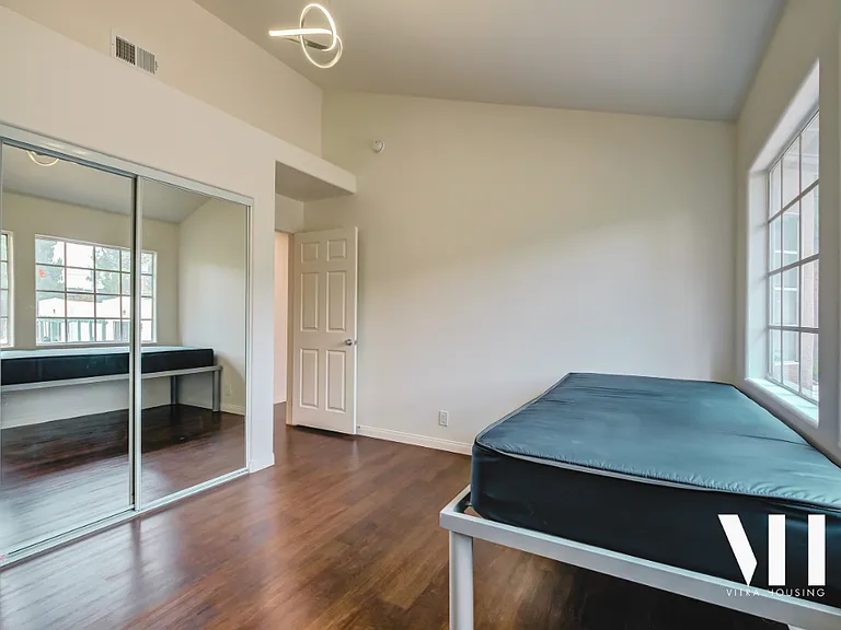 Apt A-E | 3 Bed 2.5 Bath | Half bath on first floor. Hardwood throughout, deck/balcony on 1st floor, private balcony in largest bedroom on second floor. All Stainless appliances, tons of windows, large bedrooms, tons of storage, internet included!
