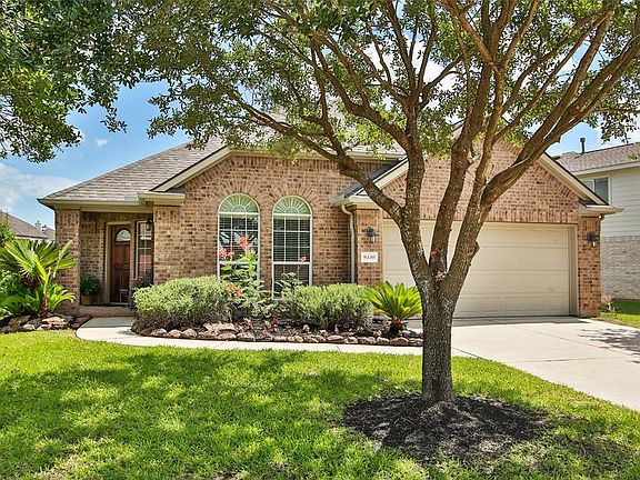 Double wide driveway, sprinklers