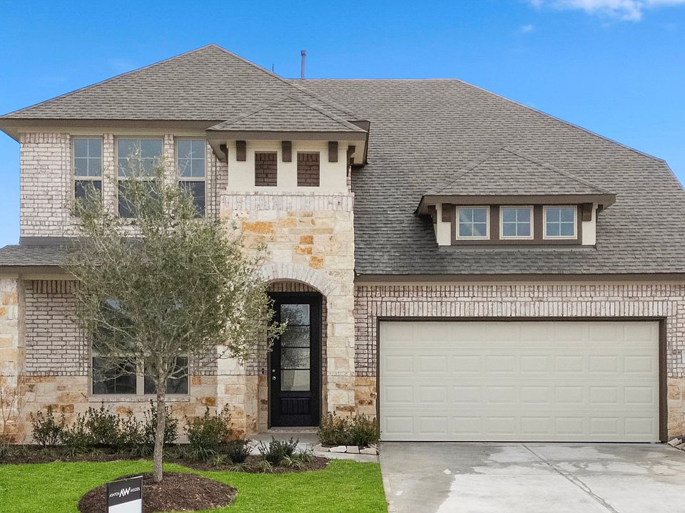 Welcome home to 2912 Cliff Ridge Lane located in the Sunterra Community and zoned to Katy ISD.