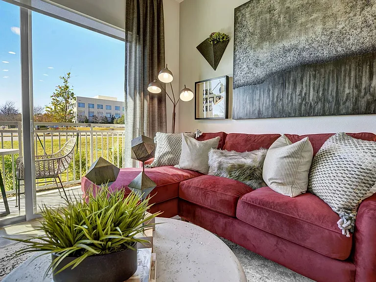 Floor-to-ceiling windows provide ample natural light.
