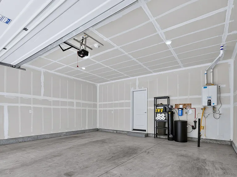 Attached Two-Car Garage & Storage Space