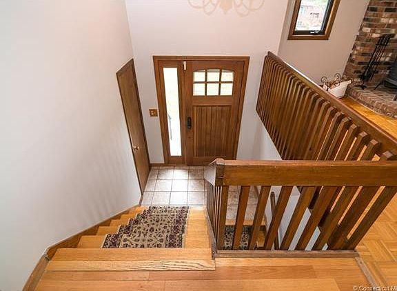 Entrance and Foyer with Coa...